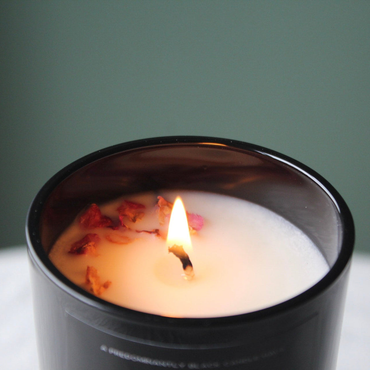 AN OPULENCE CANDLE